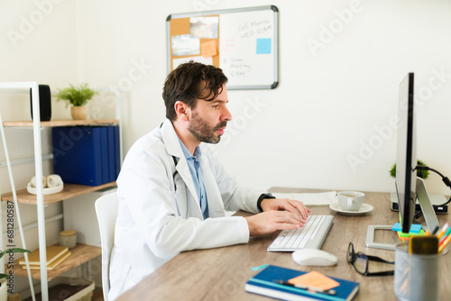 Caucasian doctor on the computer working