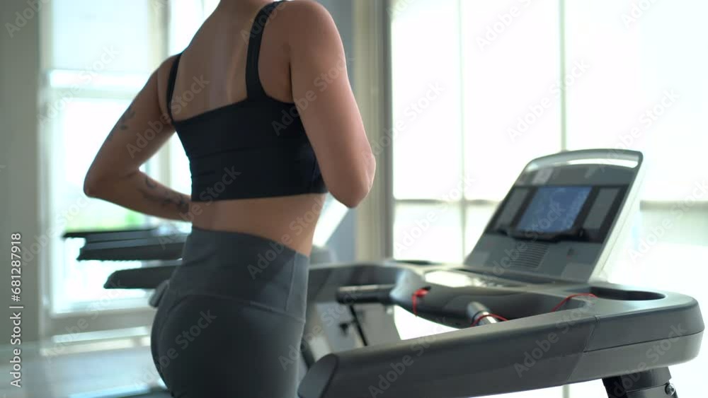 Hispanic beautiful woman exercising in fitness club. Hispanic beautiful woman exercising in fitness club.