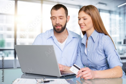 manager teaching young worker discussing strategy