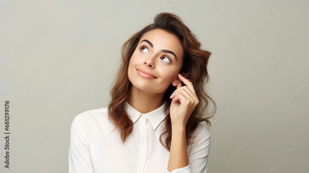 Portrait of an attractive woman thinking and looking away Portrait of an attractive woman thinking and looking away