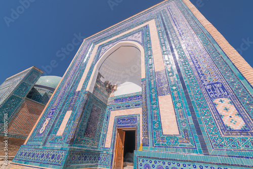 Symmetrical decorative ornament of entrance to the tomb in Shah-I-Zinda photo