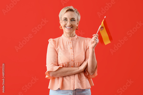 Happy mature woman with fla...