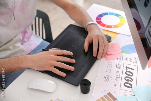 Graphic designer working on...