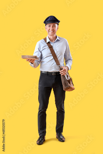 Mature postman with letters...