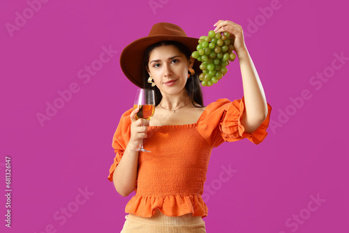 Young woman with glass of w...