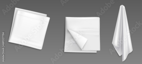 White empty handkerchief mockup - realistic vector illustration set of folded and hanging cloth napkin or kitchen towel. Fabric textile tablecloth or restaurant serviette template isolated on grey. photo
