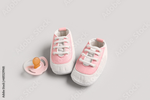 Pink and white baby sneaker...