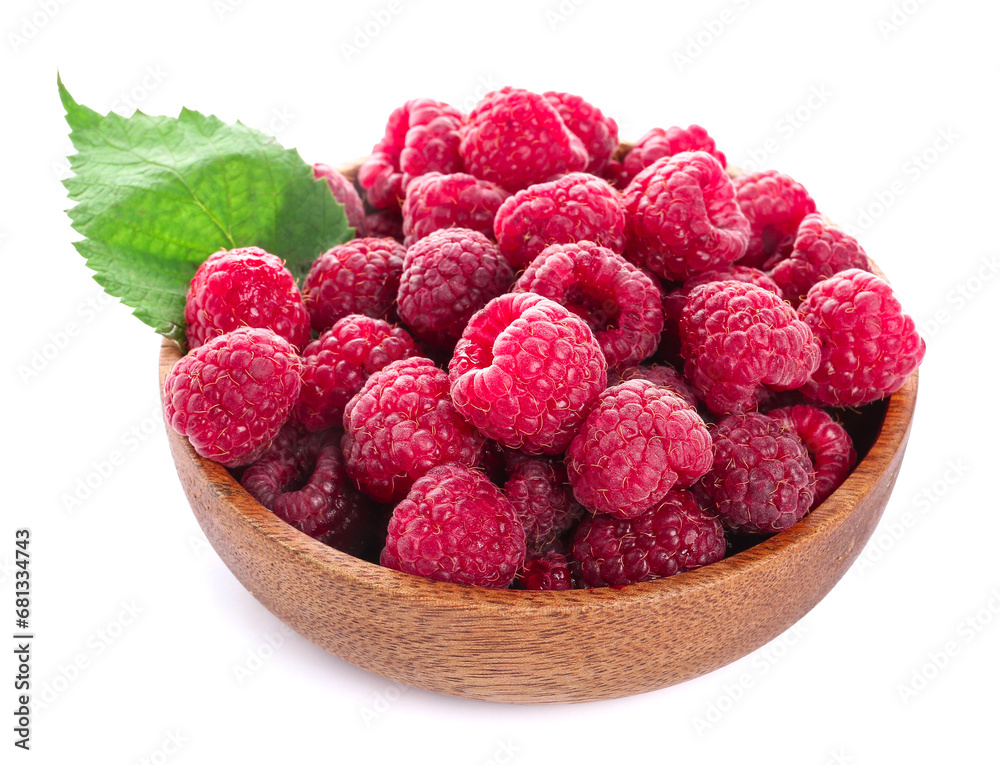 Wooden bowl with fresh ripe raspberries and leaf on white background Wooden bowl with fresh ripe raspberries and leaf on white background