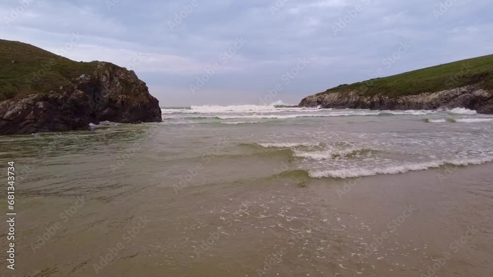 Cornwall Polly Joke seascape slowly moving over waves toward horizon and rockface Cornwall Polly Joke seascape slowly moving over waves toward horizon and rockface