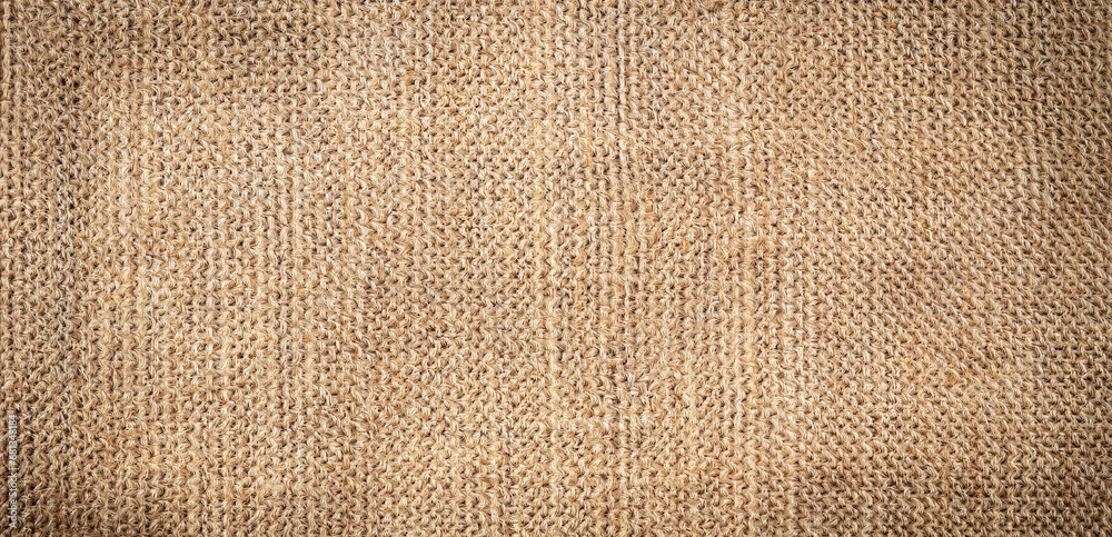 Fototapeta premium Brown canvas fabric for background, linen texture background