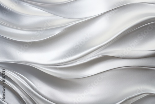 Abstract composition featuring flowing silver metal waves. 