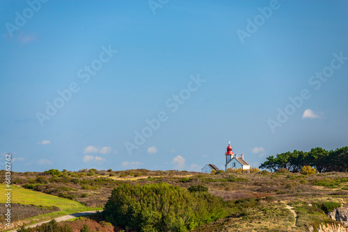 Landscape of Belle-île-en-Mer with a view of the Kerdonis lighthouse, in the town of Locmaria.