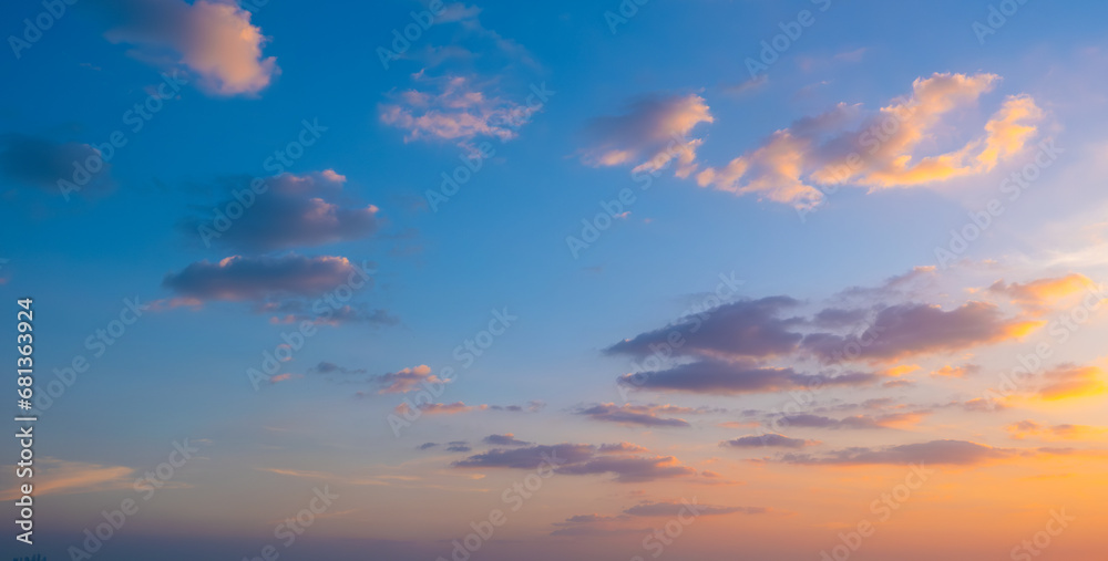 Enjoy a panoramic view of the skyline. The sun rises in the morning sky with colorful clouds. and beautiful cloud patterns In the soft light of the morning
