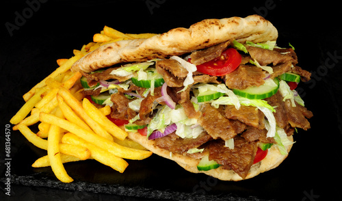 Εκτύπωση καμβά Doner kebab meat and French fries in a naan bread with salad