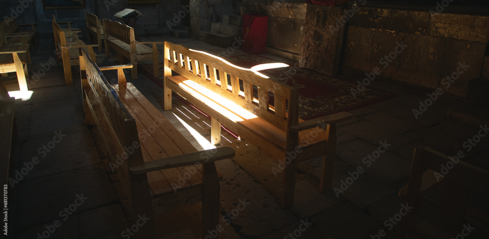 Bench at the church. Sun shines inside Bench at the church. Sun shines inside