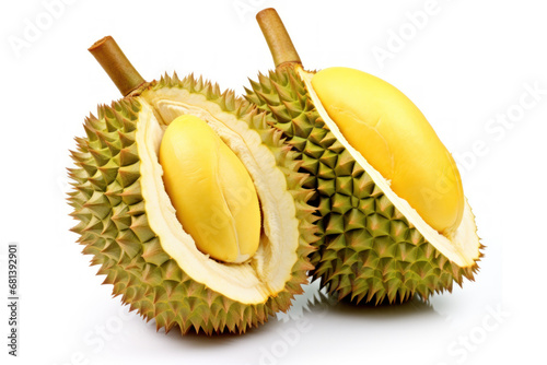 Two durian fruits cut in half Durian pulp inside seen isolated on white background.