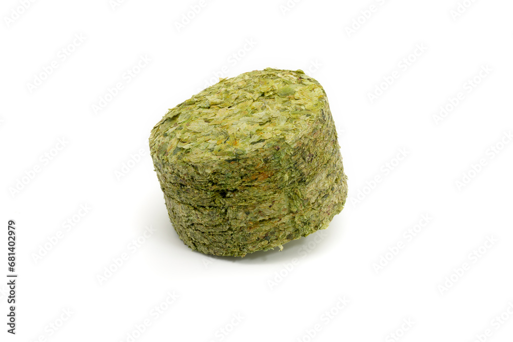 Dried hops - pressed hop pucks photographed on white background - Czech hops from the Žatec region - Czech Republic, Europe