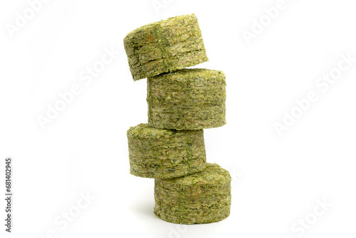 Obraz na płótnie Dried hops - pressed hop pucks photographed on white background - Czech hops from the Žatec region - Czech Republic, Europe w salonie