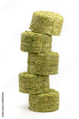 Dried hops - pressed hop pucks photographed on white background - Czech hops from the Žatec region - Czech Republic, Europe