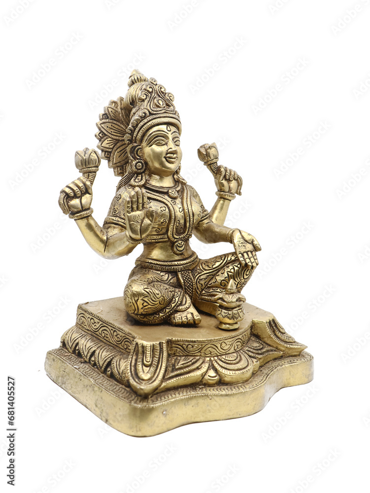 handcrafted brass idol of hindu goddess laxmi stitting with multiple arms, symbol of wealth and prosperity isolated in a white background