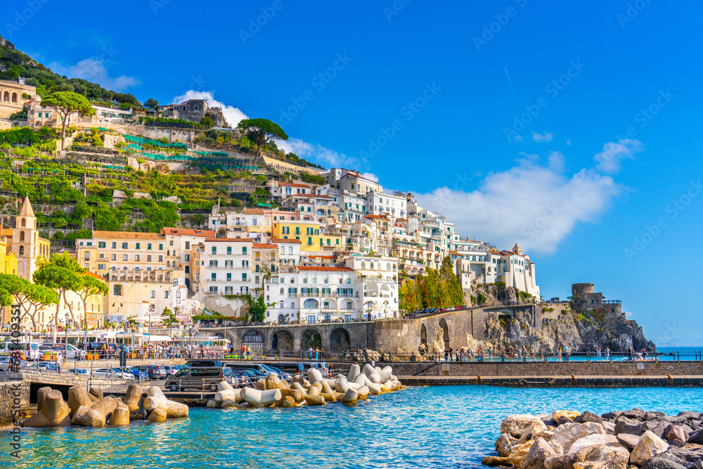 Amalfi, Italy, 29 october 2023 - harbour and part of the city seen from the pier in Amalfi