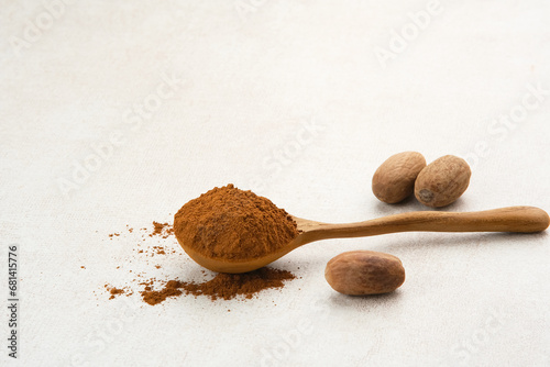 Pala Bubuk (Nutmeg Powder) on wooden spoon
 photo