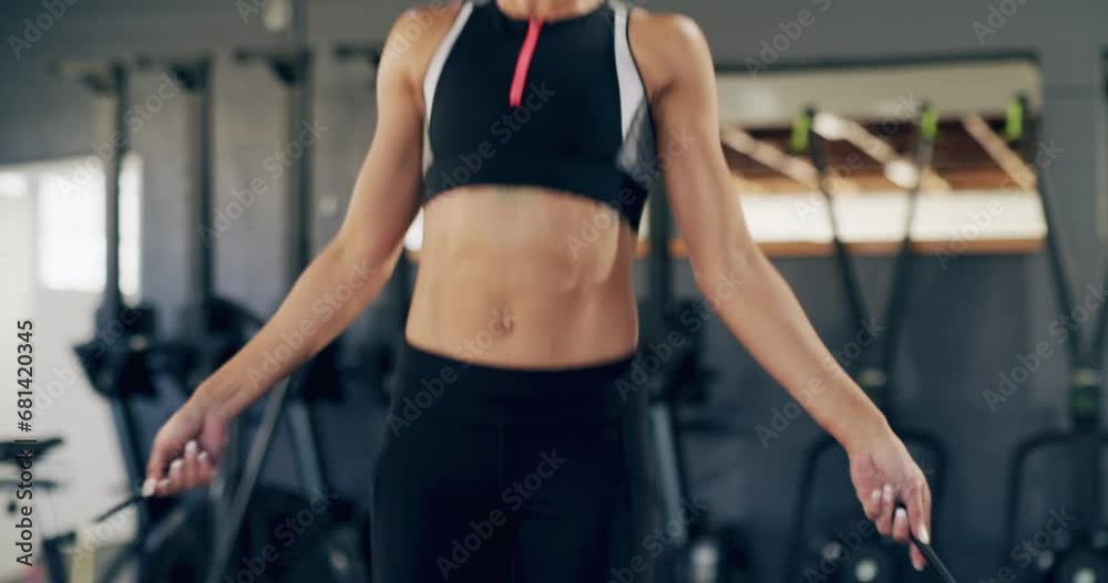 Woman, jump exercise and rope in gym for cardio, workout and training for energy, challenge or core power of healthy abs. Strong abdomen of athlete skipping for sports, fitness performance and action Woman, jump exercise and rope in gym for cardio, workout and training for energy, challenge or core power of healthy abs. Strong abdomen of athlete skipping for sports, fitness performance and action