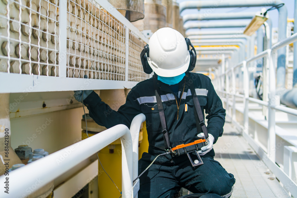 Ut Checking Non-destructive testing technicians are checking the thickness of pipes ...