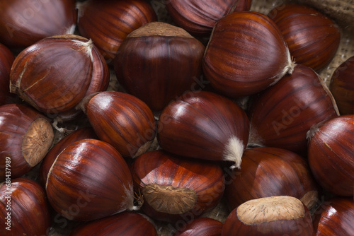Close-up of chestnuts on sackcloth