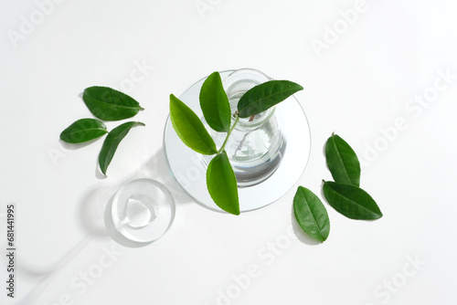 Green tea is very effective for oily and acne-prone skin. Research space with green tea leaves and glassware. Homemade cosmetics with natural extracts.