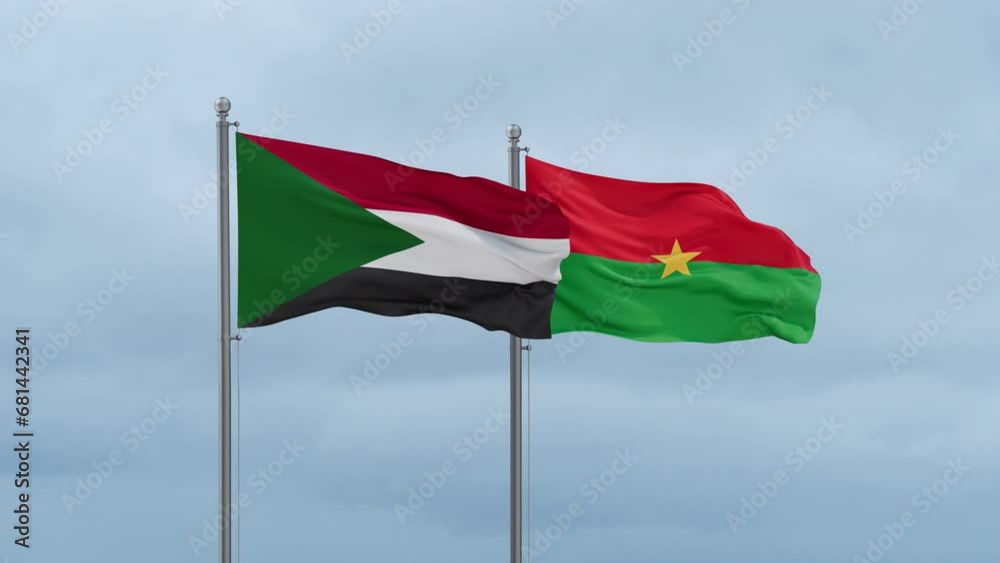 Burkina Faso flag and Sudan flag waving together on cloudy sky, endless seamless loop, two country relations concept Burkina Faso flag and Sudan flag waving together on cloudy sky, endless seamless loop, two country relations concept