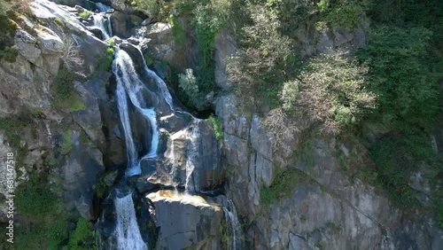 Ascending drone footage of Toxa Waterfall (Fervenza do Toxa) in Silleda town, Pontevedra, Spain photo