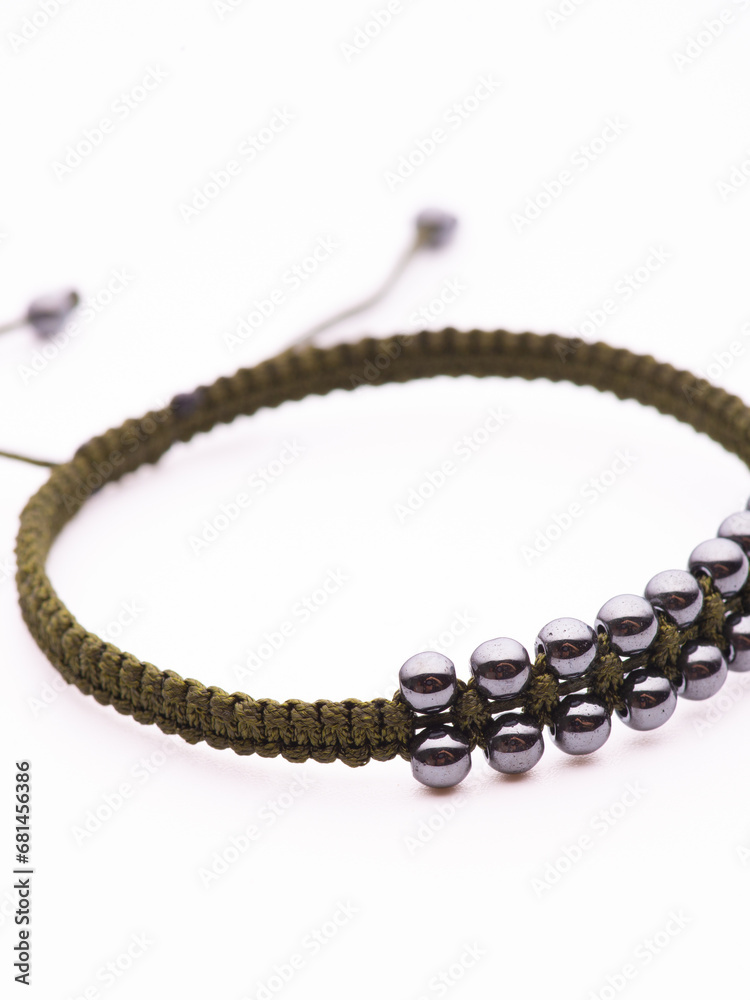 Black hematite handmade bracelet on white background Black hematite handmade bracelet on white background