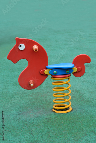 Rocking horse on a playground photo