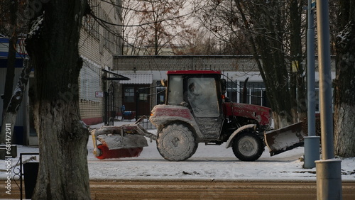 Special transport clears the streets of the city. Winter. Snow plow