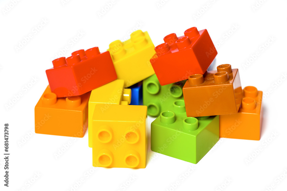Fototapeta premium Pile of Colorful Construction Blocks on white. Educational toy for children.