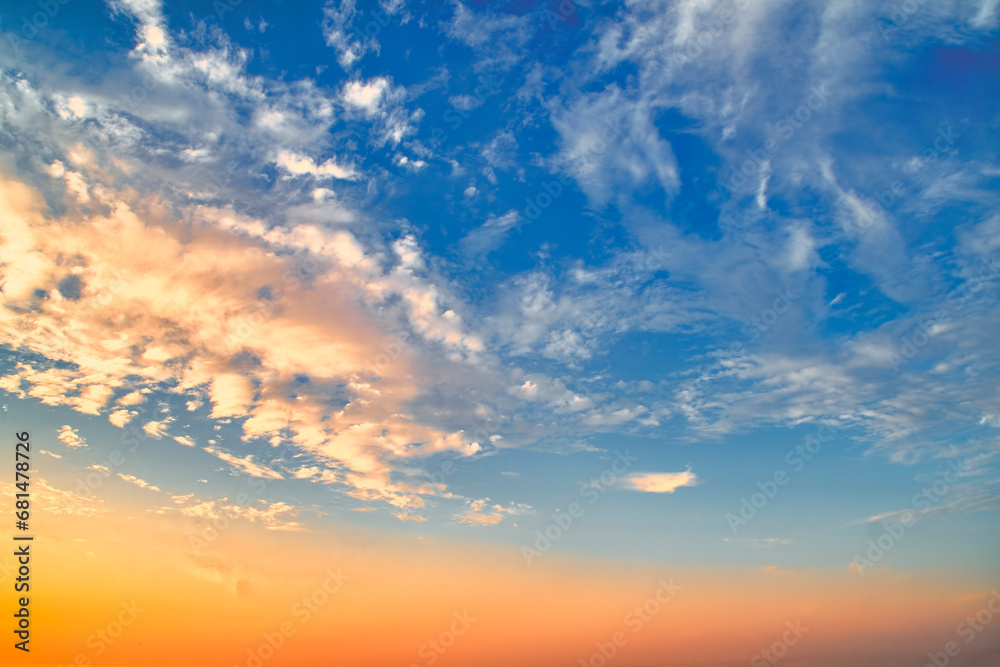 Background with sky and clouds at sunset. Romantic background on the theme of ecology and atmosphere.