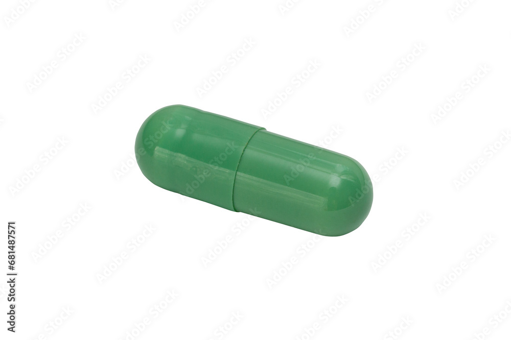A pill of green color isolated on a white background. Macro. PNG