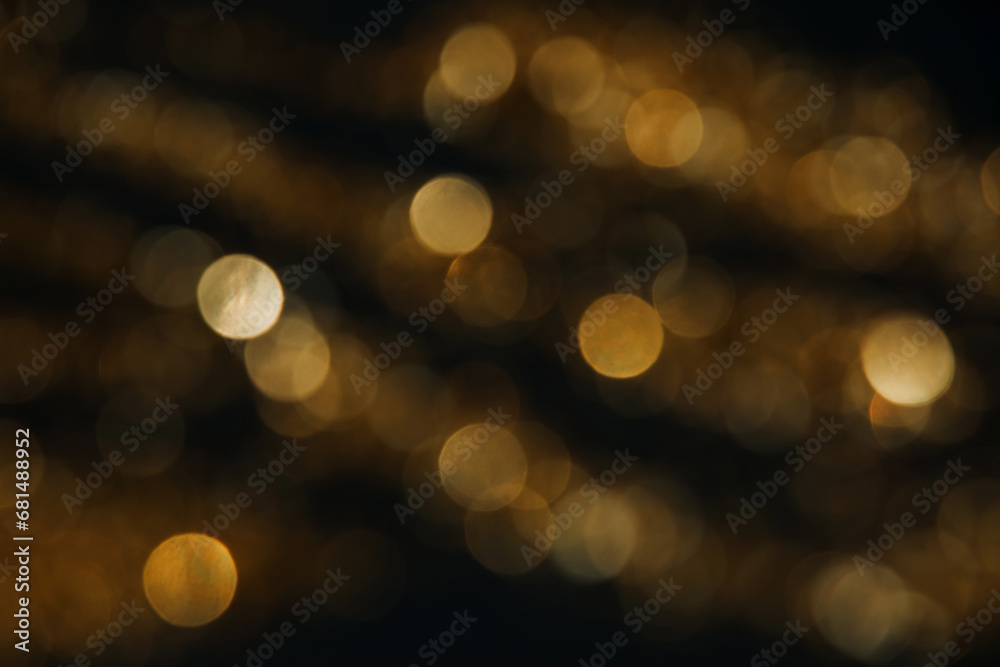 Abstract background of blurred yellow lights for design. Lights bokeh dis focus. Christmas background, copy space Abstract background of blurred yellow lights for design. Lights bokeh dis focus. Christmas background, copy space