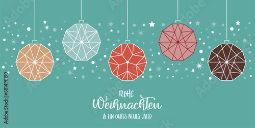 Weihnachtskarte mit Christbaumkugeln und Baumbehang mehrfarbig - deutscher Text auf weissem Hintergrund photo