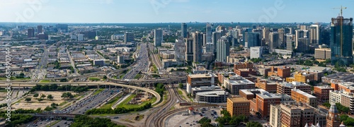 4K Image: Bustling Dallas, Texas City Traffic among Urban Skyscrapers and Buildings