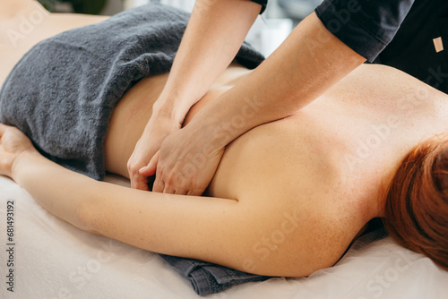 Female hands doing back massage