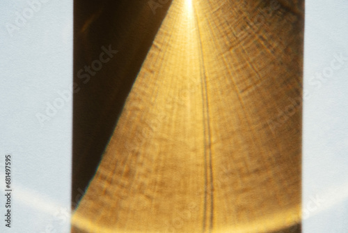 Abstract yellow gold caustic strobe prism texture overlay. Summer copy paste background