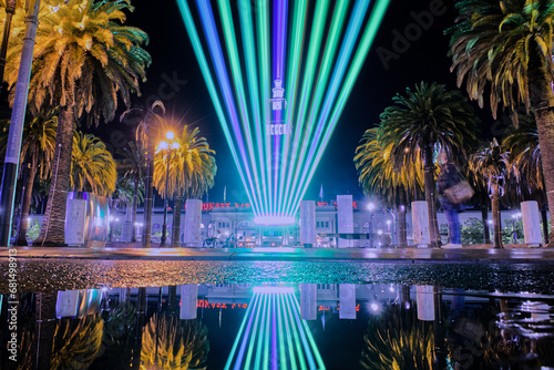 San Francisco Landscape Illuminated with Bright Lights in the Morning and Reflected in Puddle