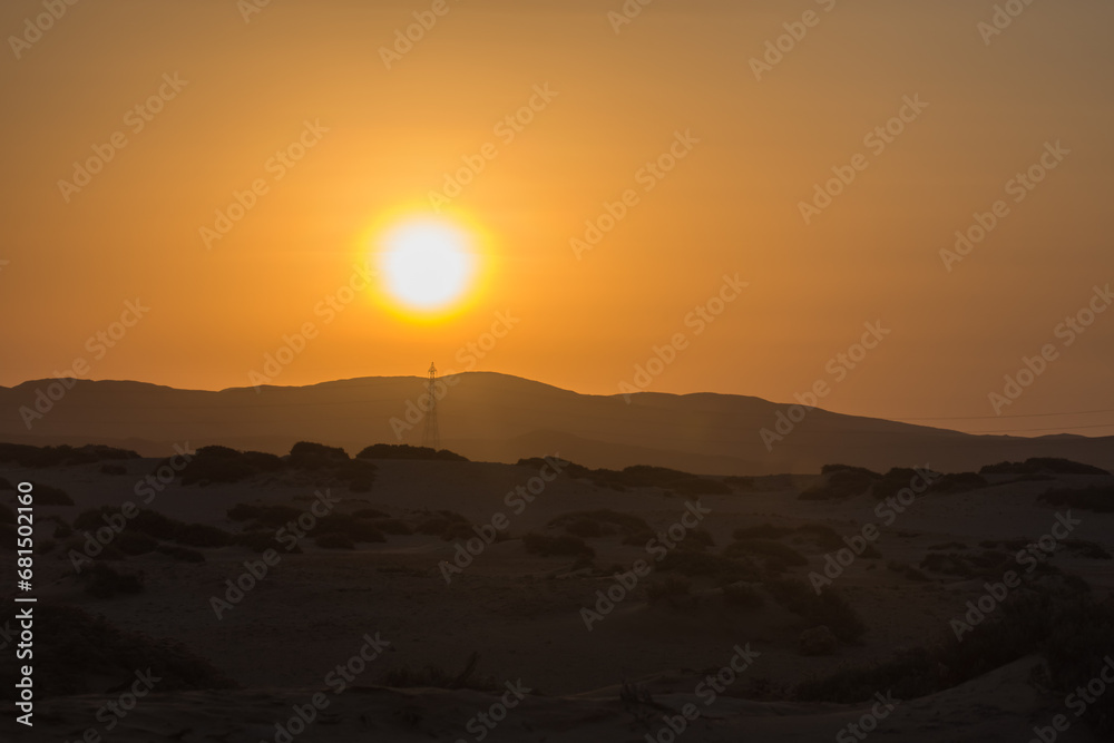 shining sun with mountains in the desert of egypt