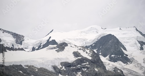 Closeup panoramic view of Pizzo Bernina and Morteratsch Glacier photo