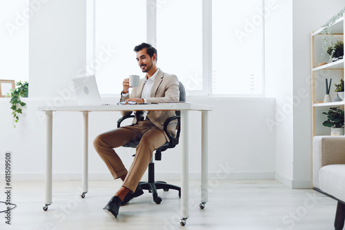 Laptop man happy smiling office businessman business computer communication executive sitting