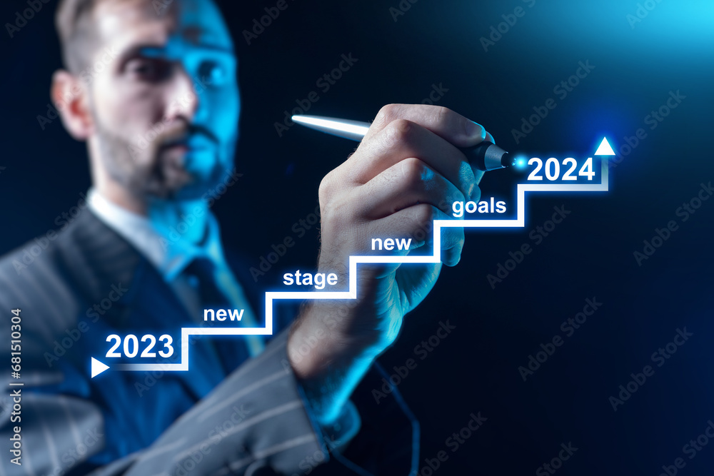 Plan for 2024. Business man draws staircase on virtual screen. Investor is engaged in strategic planning. Guy sets goals for new year. Successful man draws number 2024. Business planning Plan for 2024. Business man draws staircase on virtual screen. Investor is engaged in strategic planning. Guy sets goals for new year. Successful man draws number 2024. Business planning