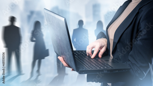 Businesswoman with laptop. ...