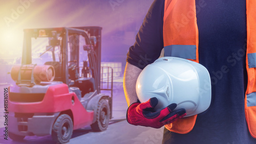 Helmet in hand of worker. H...